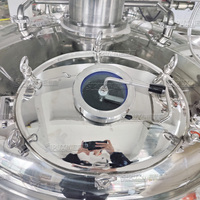 Émulsifiant d'homogénéisation sous vide chauffé à la vapeur 1500L pour la fabrication de crème cosmétique équipement d'émulsion en acier inoxydable avec contrôle PLC