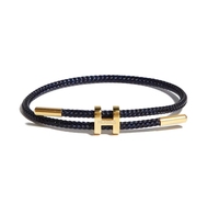 Bracelet élastique en acier titane plaqué or avec boucle en forme de H réglable pour femmes
