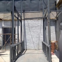 Système de levage électrique mural intelligent pour balcon résidentiel et transport vertical de petits matériaux