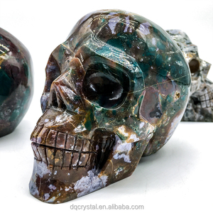 Vente en gros de crânes de jaspe d'océan colorés en cristal sculpté à la main en cristal crânes de jaspe d'océan pour la décoration feng shui - Product Image 1