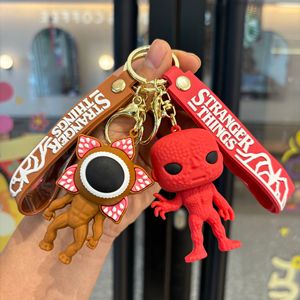 Llaveros de PVC 3D personalizados de <span class=keywords><strong>Stranger</strong></span> <span class=keywords><strong>Things</strong></span>: <span class=keywords><strong>Dustin</strong></span> y Eleven, inspirados en la serie de terror y ciencia ficción, ideales para regalos al por mayor. - Product Image 1