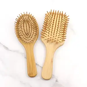 Cepillo de pelo de masaje desenredante para hombres y mujeres personalizado con logotipo privado cepillo de pelo de paleta de bambú con caja de embalaje cepillo de pelo de Bambú