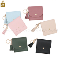 Porte-cartes de crédit en similicuir simple Pochette portefeuille à glands fantaisie Étui de transport portable pour cartes et pièces de monnaie