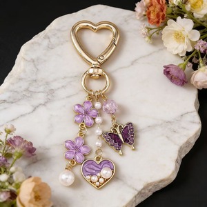 Porte-clés tendance personnalisés animaux et fleurs, breloques de sac, vente chaude transfrontalière, bijoux papillon et cœur à la mode - Product Image 1