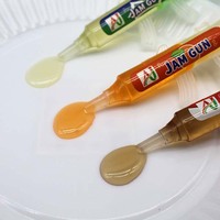 Vente en gros seringue en forme de pistolet bonbons à boisson au jus aromatisé aux fruits bonbons à la gelée