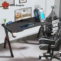 Escritorio para Computadora AOR Gaming, Superficie de Madera y Metal, Luces LED RGB, Diseño Ergonómico, Estructura de Acero para Oficina en Casa