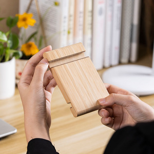 Soporte universal para teléfonos móviles y tabletas, compacto y portátil, soporte de escritorio de bambú con dos ranuras. - Product Image 2