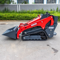 Chargeuse compacte 1000 avec moteur trois cylindres, pompe à piston, nombreux accessoires et godet à nivellement automatique