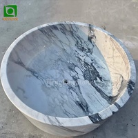 Lavabo en marbre sculpté à la main, poli haute brillance, sur mesure