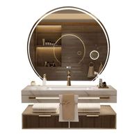 Meuble de salle de bain de luxe avec lavabo intégré en dalle de roche, combinaison de toilettes et de lavabo double vasque