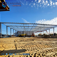 Edificio de taller de estructura de acero OEM, naves industriales prefabricadas de acero con diseño de gran envergadura