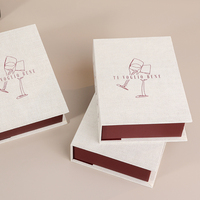 Boîte cadeau magnétique en lin blanc de qualité supérieure, forme de livre, boîte rigide de luxe, intérieur rouge vin, emballage pour vêtements, bijoux, logo personnalisé