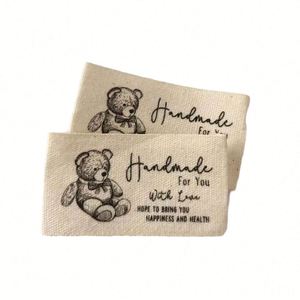 Etiquetas Tejidas de Algodón Personalizadas al por Mayor, MOQ Bajo de 100 Piezas, Etiquetas para Ropa - Product Image 5