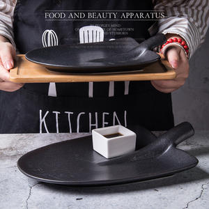 <span class=keywords><strong>Assiette</strong></span> plate en céramique noire abstraite givrée en forme de pelle pour snacks de steak, idéale pour hôtels et restaurants - Product Image 2