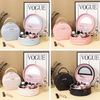 Étui à maquillage rond personnalisé en cuir PU, sac cosmétique portable avec miroir, boîte de rangement matelassée imperméable pour les voyages