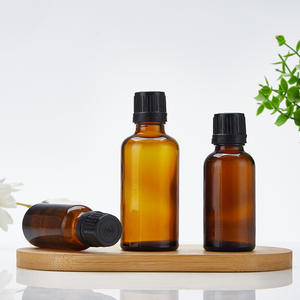 Vente en gros rechargeable 15ml 50ml 100ml bouteille cylindrique en verre de Boston bouteille en verre d'huile essentielle cosmétique ambre avec couvercle à vis - Product Image 3