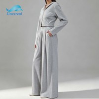 Ensemble de survêtement deux pièces personnalisé : sweat à capuche court à double fermeture éclair et pantalon de survêtement plissé à jambes larges en molleton doux, style streetwear décontracté et loungewear