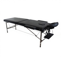 Chaise de massage professionnelle Union Win avec cadre noir, dossier réglable, surmatelas intégré et extension de table pour salon de beauté
