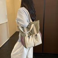 Sac fourre-tout léger en nylon grande capacité à bandoulière unique avec fermeture à cordon en polyester, style décontracté et tendance pour l'été