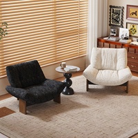 Fauteuil d'appoint contemporain surdimensionné en tissu avec pieds en bois, confortable pour la lecture et la détente, idéal pour les hôtels, cafés, halls d'entrée et salons.