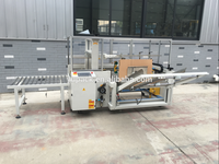 Machine d'emballage de boîtes en carton