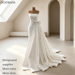 Robe de mariée de luxe minimaliste Ocstrade sans bretelles en satin avec strass scintillants, ceinture latérale, longue traîne et dos corset, robe de mariée personnalisée - Product Image 1