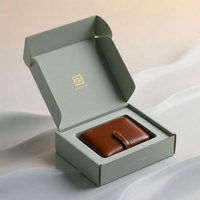 Boîtes d'expédition bleues avec logo personnalisé pour petites entreprises Boîte cadeau d'emballage en carton ondulé recyclable pour vêtements