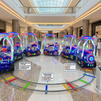 Train à pédales pour enfants de style britannique avec piste circulaire détachable et lumières LED pour 5 à 10 passagers