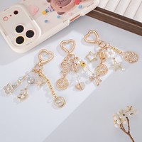 Porte-clés Cœur Doré avec Fermoir, Perles de Cristal, Pendentif Métal Creux, Breloque de Sac, Étoile, Lune, Nœud, Symbole Dollar, Anneau de Clés pour Sac à Main, Cadeau pour Femme