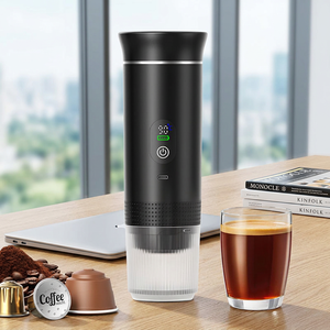 Machine à café compacte et portable, légère, pour expresso, idéale pour les voyages, la voiture et le bureau. - Product Image 1