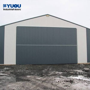 Panneau sandwich très vendu Portes de garage pliantes robustes et automatiques de haute qualité Portes de hangar en acier pliantes verticales - Product Image 4