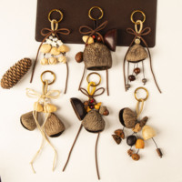 Porte-clés pour femme, breloque de sac, avec motifs grain de fruit, gland, cône de pin, clochette, sur cordon en cuir, style bohème, forêt, vintage, cadeau pour elle