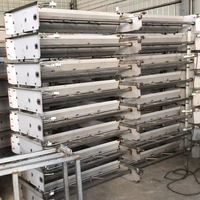 La machine automatique de grattage de fumier de ferme de volaille équipement de suppression des matières fécales d'élevage peut être personnalisée en acier inoxydable