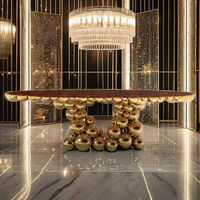 Table de salle à manger moderne de luxe en acier inoxydable plaqué or avec dessus ovale en fonte laquée pour la maison et les meubles d'hôtel