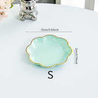 2025 maison Table à manger haut de gamme Snack assiette moderne en plastique de qualité alimentaire léger luxe fruits et scories plat nouveau Os cracher Style