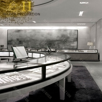 Einzigartiges Design Fächerförmige Glas-Schmuckvitrine Abschließbare Uhren-Ausstellungsvitrine mit Schubladen und LED-Beleuchtung