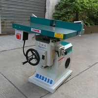 Machine à profiler et à cisailler le bois avec table inclinable et orientable à 45 degrés