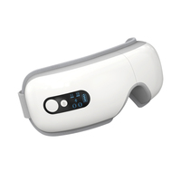 Masseur oculaire électrique blanc en PU, pliable à 180°, avec chauffage intelligent, vibrations et musique, rechargeable 1200 mAh
