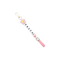 Nouveau Porte-clés en silicone style japonais-coréen transfrontalier, motif fleur, avec perles lettres DIY et pompon, ornement pendentif pour voiture et sac, modèle Chine