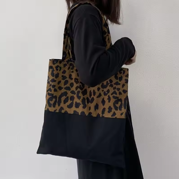 Leopard print paneled black canvas