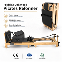 Lit de Pilates pliable en bois de chêne OEM pour la maison, le studio et l'entraînement de fitness, machine de Pilates Reformer