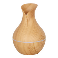 Diffuseur d'arômes à chargement USB Offre Spéciale transfrontalier Style grain de bois grand volume de brume Mini dispositif d'hydratation pour capteur d'air