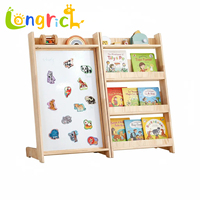 Station d'apprentissage Montessori pour enfants avec rangement pour livres et tableau magnétique créatif