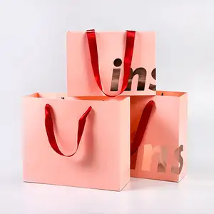 零售纸手提袋纸板纸包装袋带定制标志纸礼品袋带手柄和丝带收件衣服