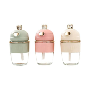 Bouteille d'eau portable en verre avec paille, design lapin de dessin animé mignon pour femme, personnalisable, idéale pour le café - Product Image 1