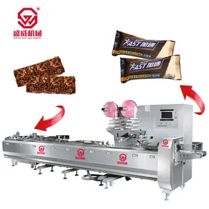 Shengwei makineleri yüksek gıda besleyici ve lezzetli meyve aperatif enerji Bar paketleme makinesi