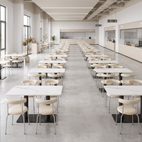Mobilier de restauration minimaliste commercial, tables en pierre frittée sur mesure et chaises ergonomiques