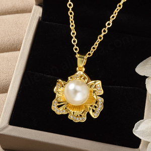 Conjunto de Joyería de Moda al por Mayor, Anillo, Aretes y Collar con Colgante de Flores de Circonita y Perla Chapados en Oro de 18k de Primera Calidad - Product Image 2