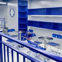 Mobilier de restauration commerciale légère, tables durables en acier inoxydable et chaises pliantes empilables en acrylique pour bistrots de thé au lait