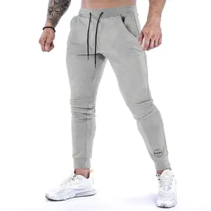 Serigrafia di lusso di alta qualità in esecuzione in pile personalizzato pista sportiva all'ingrosso palestra uomo pantaloni Jogger pantaloni in cotone